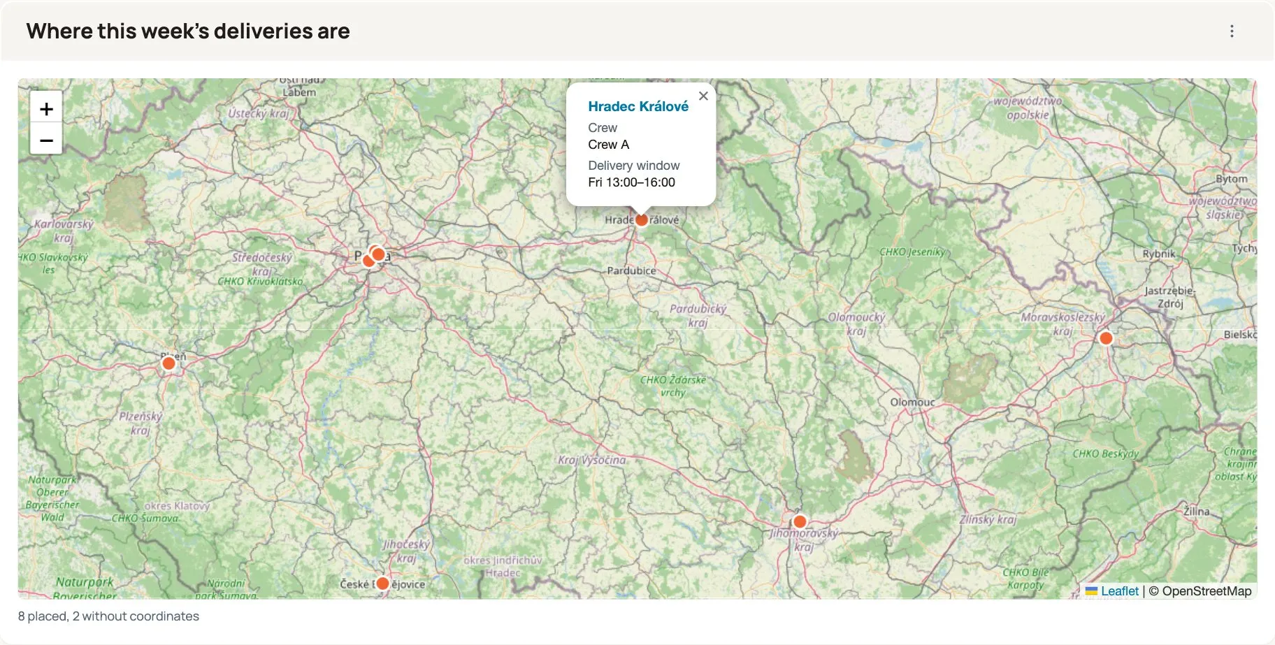 A dashboard tile titled "Where this week's deliveries are": eight orange pins across the Czech Republic on an OpenStreetMap background, with one popup open showing Hradec Kralove as a link, its crew and its delivery window. Underneath, the line "8 placed, 2 without coordinates".