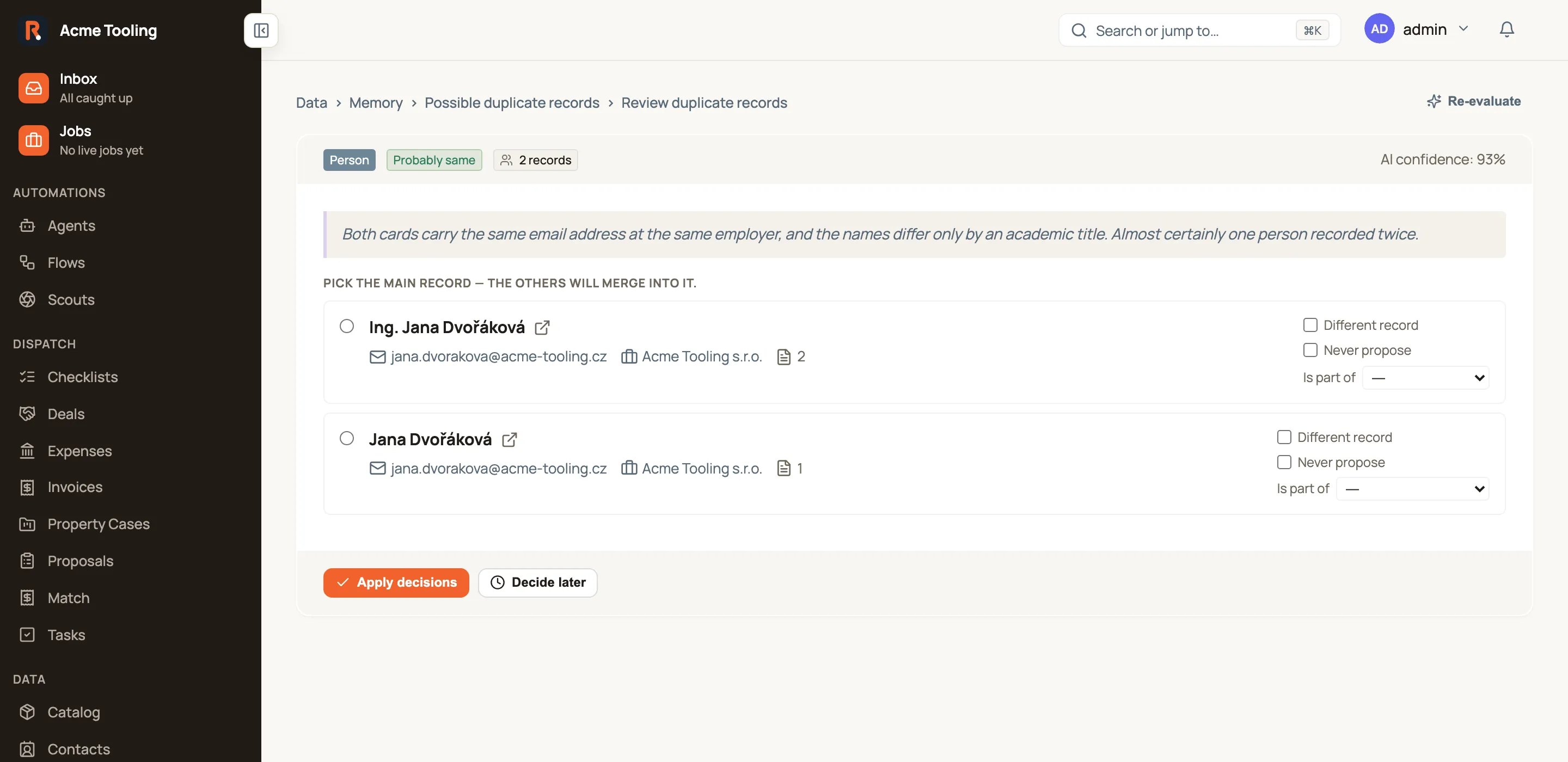 The review page for one duplicate group. Breadcrumbs read Data, Memory, Possible duplicate records, Review duplicate records. A Person chip, a Probably same chip and a "2 records" chip sit at the top with 93% AI confidence, above the AI's full reasoning. Under the heading "Pick the main record — the others will merge into it" are two rows: "Ing. Jana Dvořáková" and "Jana Dvořáková", each showing the same email address, the employer Acme Tooling s.r.o. and a document count, with Different record and Never propose checkboxes and an "Is part of" dropdown on the right. Apply decisions and Decide later buttons sit at the bottom.
